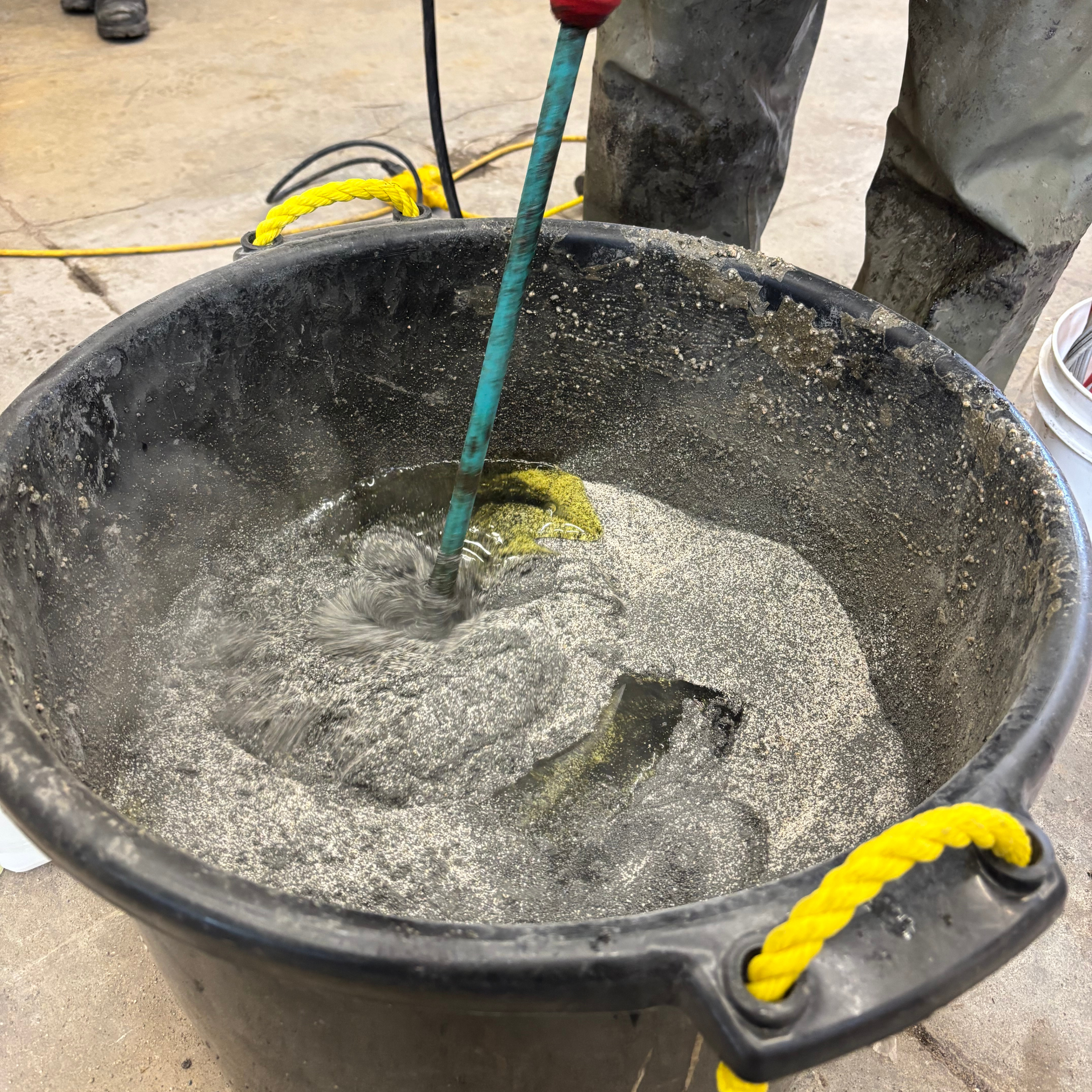 Mix all components in a bucket with a drill mixer
