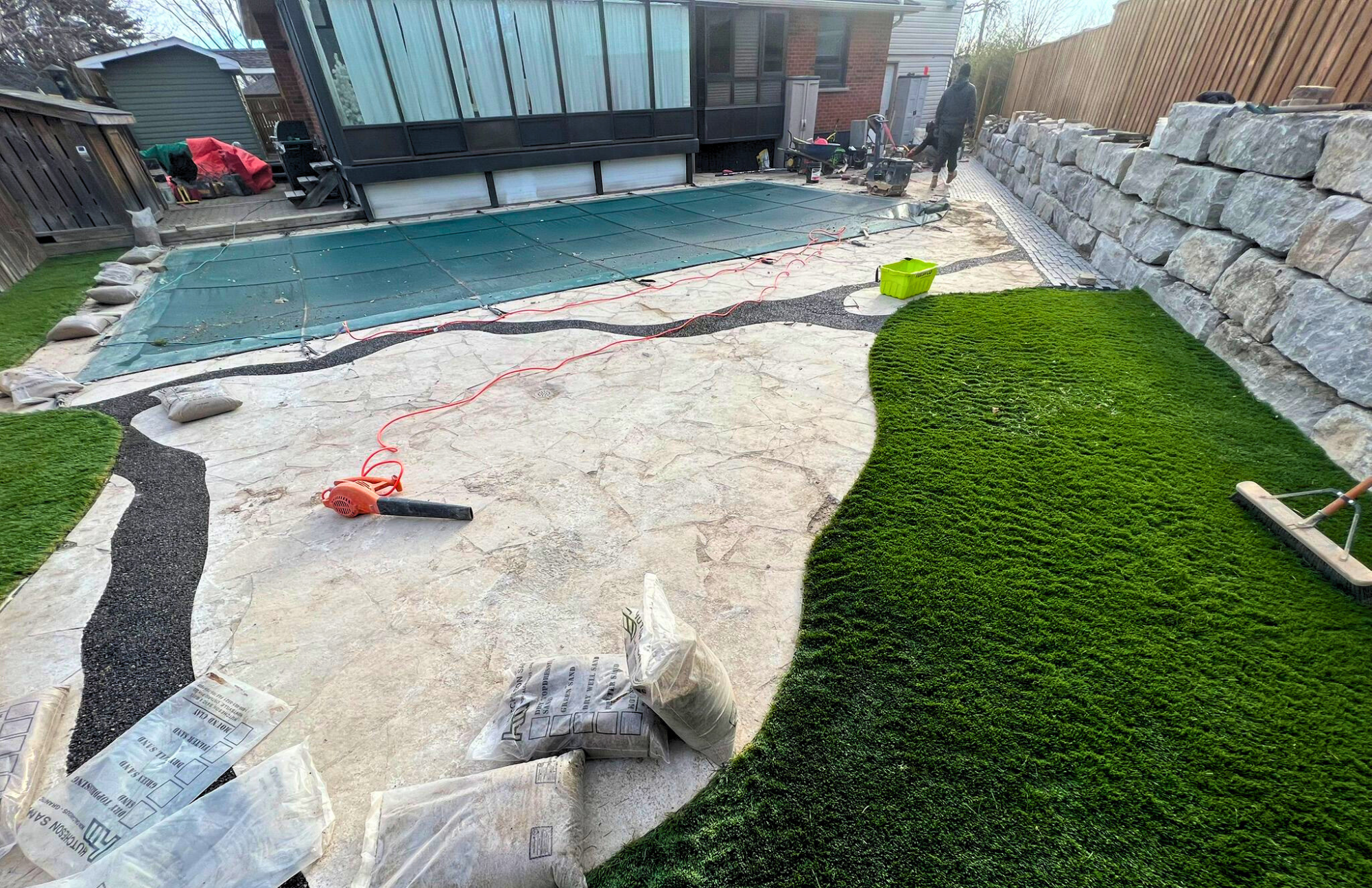 Transforming Flagstone with Artificial Turf and Bonded Gravel
